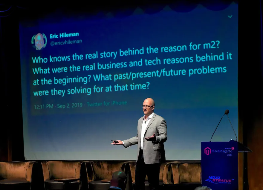 Eric Hileman speaking on stage