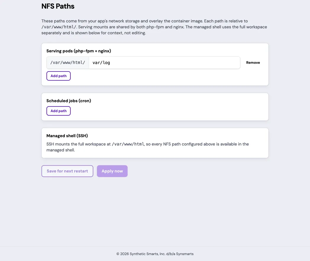 The NFS Paths page for an example App shows the Serving pods (php-fpm + nginx) and Scheduled jobs (cron) consumer cards and the Managed shell (SSH) card. The serving card mounts var/log under /var/www/html/; the scheduled-jobs card has no paths. The Save for next restart and Apply now controls sit below.